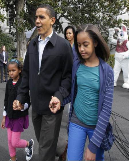 Barack Obama con sus hijas