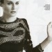 Diane Kruger con un vestido con brillantes posando estatica