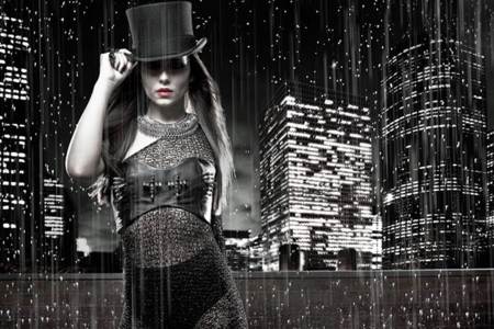 Cheryl Cole con un sombrero de copa y una imagen sexy