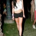 Lindsay Lohan con shorts negros mostrando sus piernas en el Festival de Coachella 2010