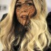 Lady GaGa con velo negro en el rostro Lady GaGa con velo negro en el rostro y su cabello rubio por fuera
