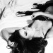 Ashley Bradarich, Miss Illinois posando sensual acostada en la cama