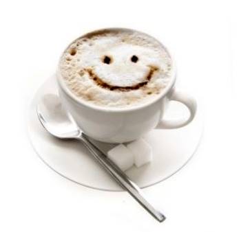 Taza de cafe con una cara sonriente